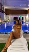 Monika Fox - I'm wearing a red bikini and showing boobs in pool! Watch my video by...